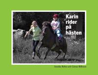 Karin rider på hästen